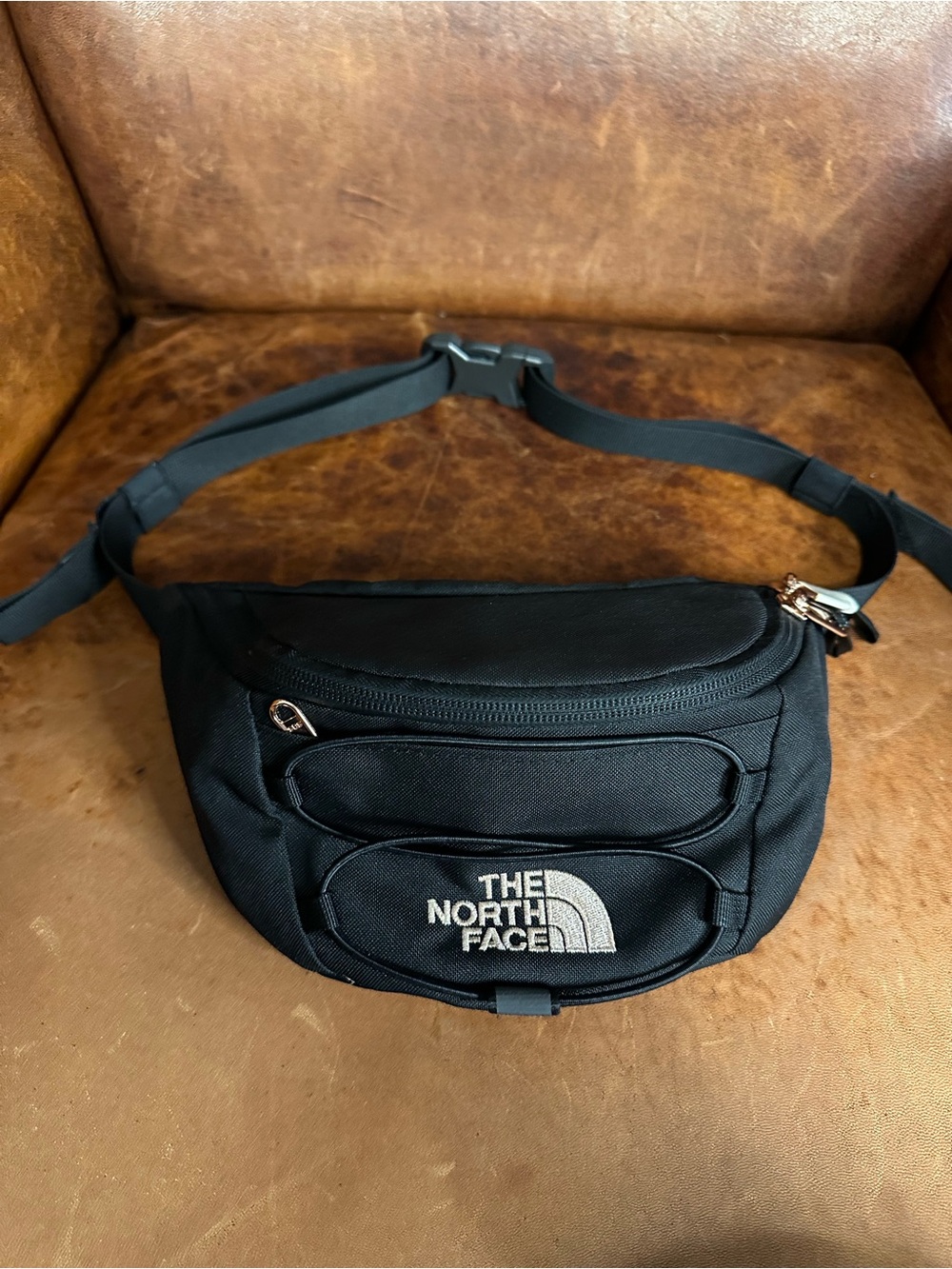 The North Face Black Mini Waist Bag Rose Gold Tone Hardware and Logo